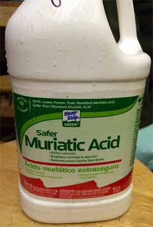 Mix up Muriatic acid and baking soda solution