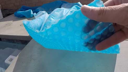 solar blanket for pool leave on or off to heat water