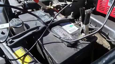 Car battery power source for a portable air compressor