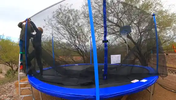 Backyard trampoline sprinkler